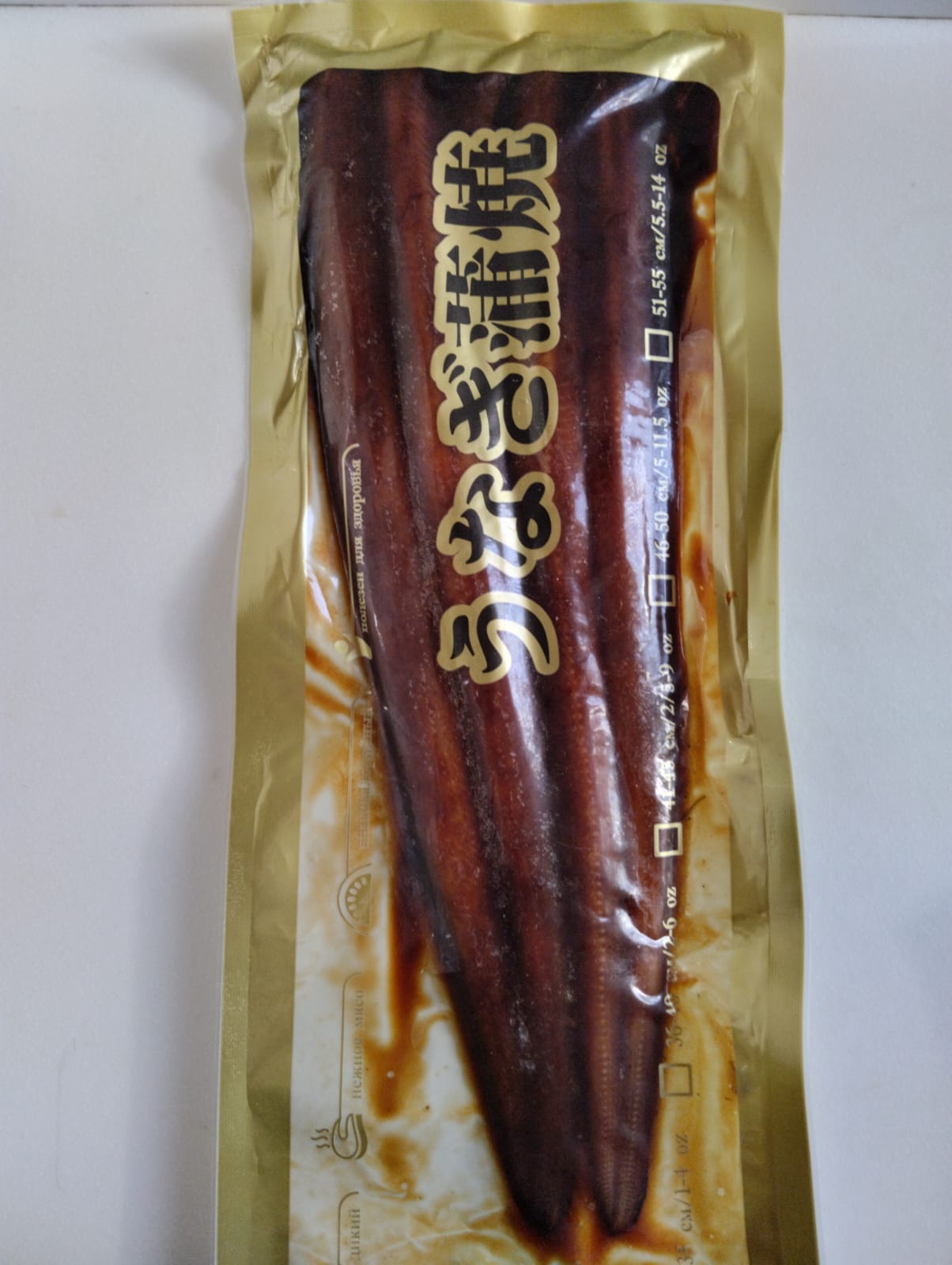 Угорь жареный 10 % соуса  в/у /вес